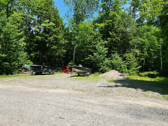 25 Loop Rd, Chester, ME 04457 - view of yard featuring a wooded view