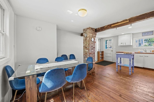 3 Surf Ave, Biddeford, ME 04005 - dining area featuring hardwood / wood-style floors, ornate columns, and beam ceiling