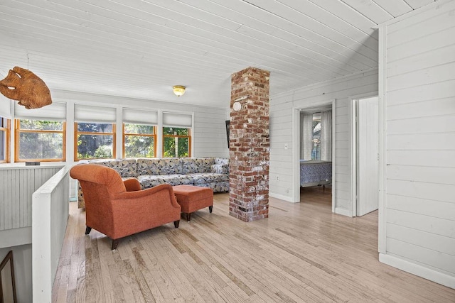 3 Surf Ave, Biddeford, ME 04005 - living area with light wood finished floors, wood walls, and wooden ceiling