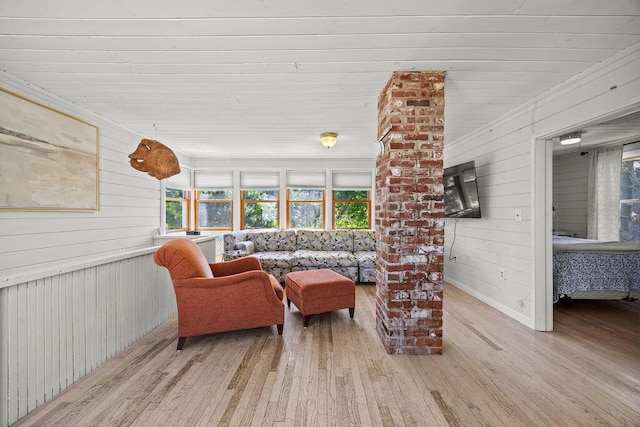 3 Surf Ave, Biddeford, ME 04005 - living area featuring wood finished floors and wooden walls