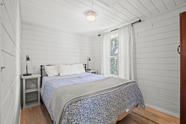 3 Surf Ave, Biddeford, ME 04005 - bedroom featuring wood finished floors and wood walls