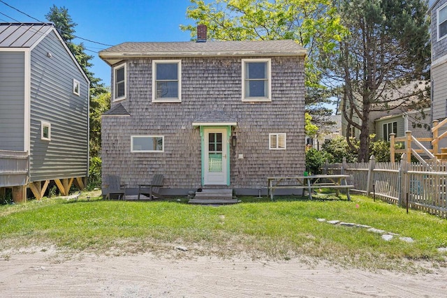 3 Surf Ave, Biddeford, ME 04005 - view of front of home with entry steps, a chimney, and a shingled roof
