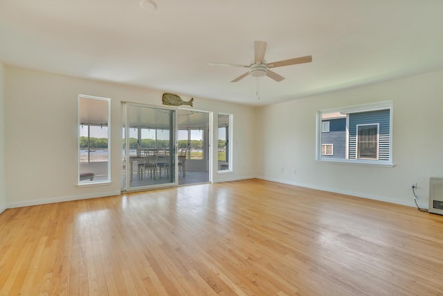 9 Riverside Ave, Saco, ME 04072 - unfurnished room with ceiling fan and light wood-style floors