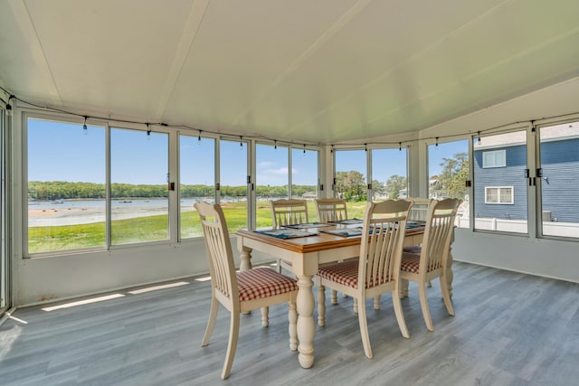 9 Riverside Ave, Saco, ME 04072 - sunroom featuring wood finished floors, outdoor dining area, and a water view