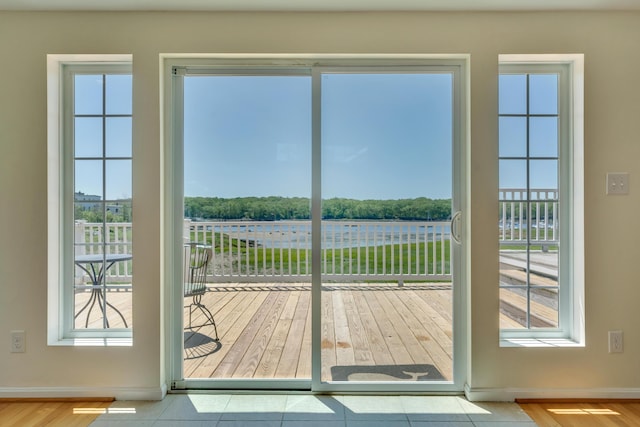 9 Riverside Ave, Saco, ME 04072 - doorway to outside with baseboards and wood finished floors
