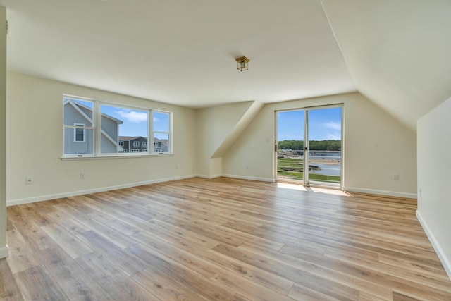 9 Riverside Ave, Saco, ME 04072 - additional living space featuring light wood-style flooring and lofted ceiling
