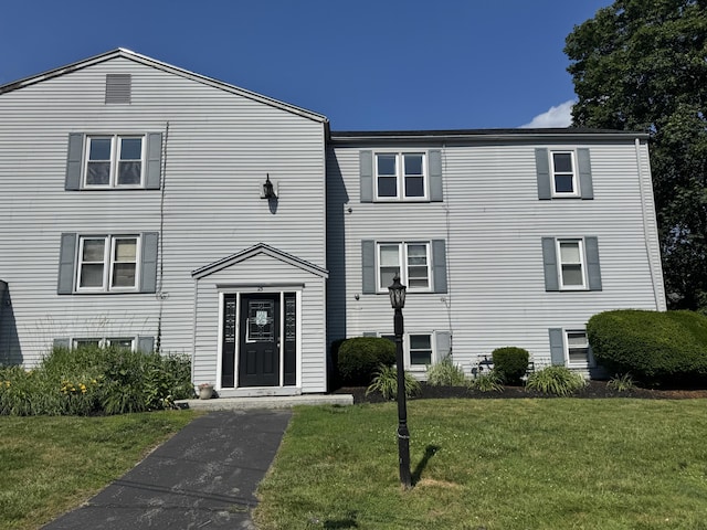 25 Minott St Unit 9, South Portland, ME 04106 - view of front of house with a front yard