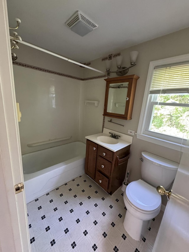 25 Minott St Unit 9, South Portland, ME 04106 - bathroom featuring vanity,  shower combination, and tile patterned flooring