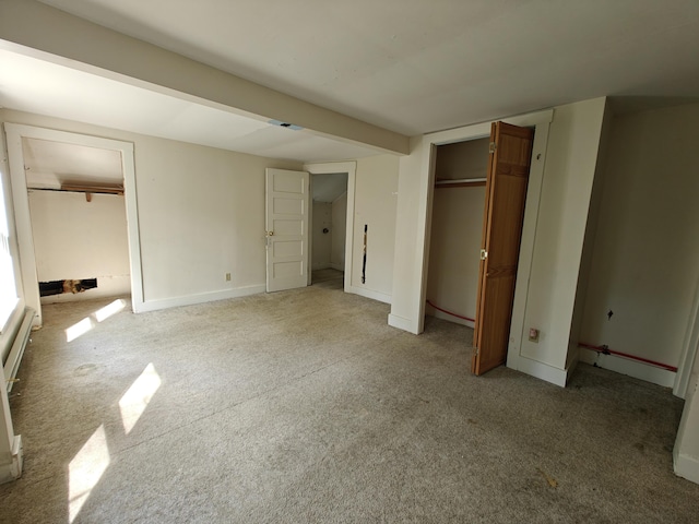 1052 Douty Hill Rd, Sangerville, ME 04479 - unfurnished bedroom featuring light carpet and baseboards