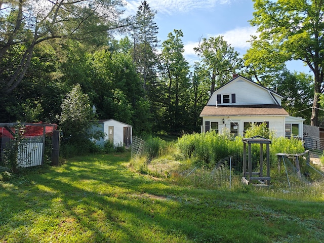 1052 Douty Hill Rd, Sangerville, ME 04479 - view of green lawn featuring a storage unit