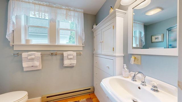 486 Webbs Mills Rd, Raymond, ME 04071 - half bath with a baseboard heating unit and a sink