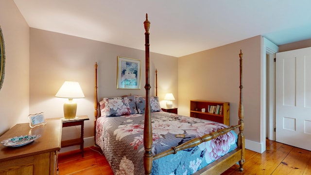 486 Webbs Mills Rd, Raymond, ME 04071 - bedroom featuring hardwood / wood-style flooring and baseboards
