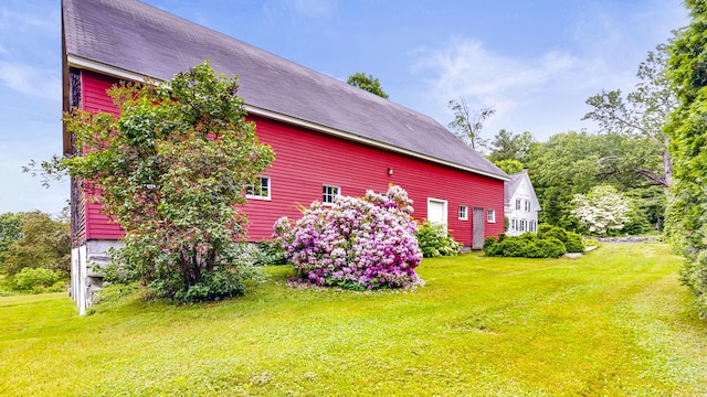 486 Webbs Mills Rd, Raymond, ME 04071 - view of side of home with a yard