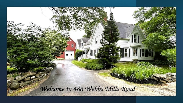486 Webbs Mills Rd, Raymond, ME 04071 - view of front of property featuring driveway and a chimney