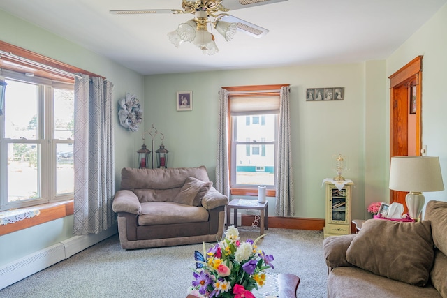 11 Gertrude Ave, Biddeford, ME 04005 - living area featuring ceiling fan, carpet floors, and baseboard heating