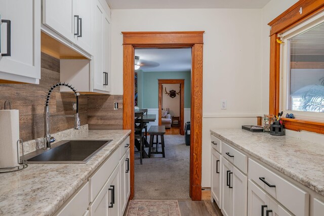 11 Gertrude Ave, Biddeford, ME 04005 - kitchen with white cabinets and light carpet