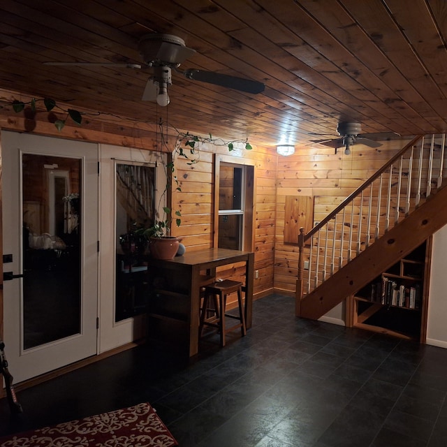 71 Mountain View Dr, Hartford, ME 04220 - unfurnished dining area featuring ceiling fan, wood ceiling, and stairway