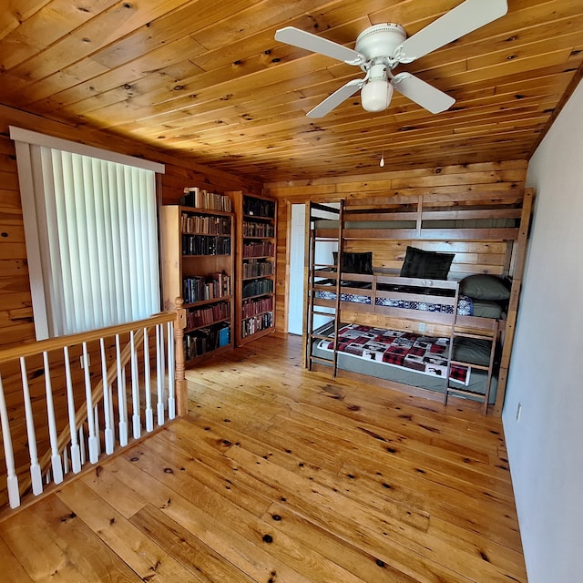 71 Mountain View Dr, Hartford, ME 04220 - office with wood ceiling, wood walls, wood-type flooring, and a ceiling fan