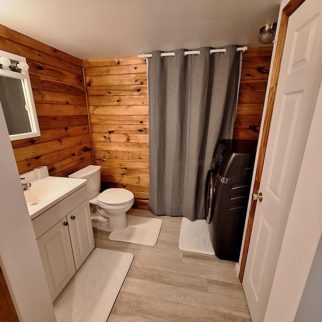 71 Mountain View Dr, Hartford, ME 04220 - bathroom with wood finished floors, vanity, and a shower with curtain