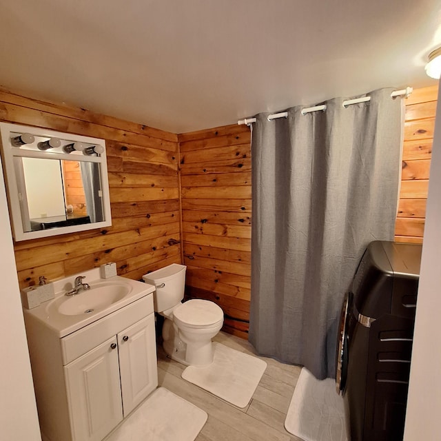 71 Mountain View Dr, Hartford, ME 04220 - full bath featuring vanity, wood walls, curtained shower, and wood finished floors