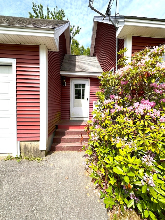 27 Hodgdon Rd, Levant, ME 04456 - property entrance with roof with shingles