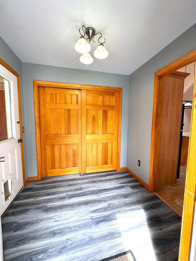 27 Hodgdon Rd, Levant, ME 04456 - entryway featuring a chandelier and wood finished floors
