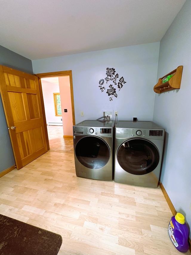 27 Hodgdon Rd, Levant, ME 04456 - washroom with washer and clothes dryer and wood finished floors