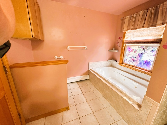 27 Hodgdon Rd, Levant, ME 04456 - bathroom featuring a jetted tub, baseboard heating, and tile patterned floors