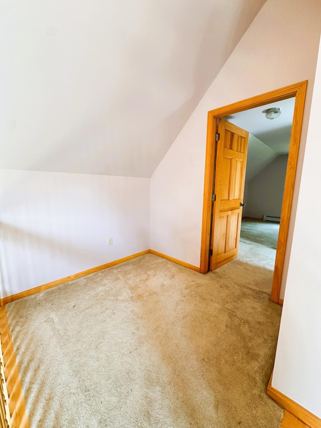 27 Hodgdon Rd, Levant, ME 04456 - additional living space with vaulted ceiling, carpet, and baseboard heating