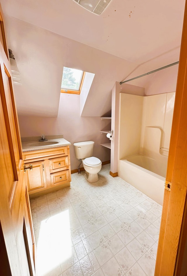 27 Hodgdon Rd, Levant, ME 04456 - bathroom with a skylight, vanity, bathing tub / shower combination, and vaulted ceiling