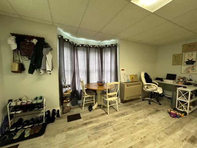 46 Cedar St, Dover-Foxcroft, ME 04426 - home office featuring a paneled ceiling and wood finished floors
