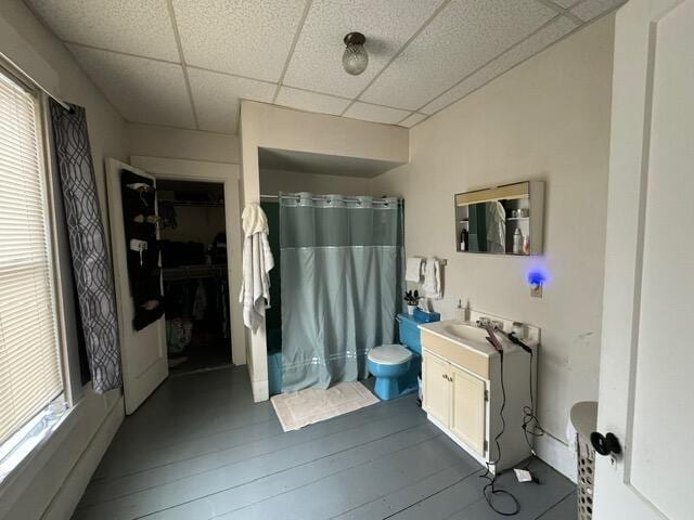 46 Cedar St, Dover-Foxcroft, ME 04426 - bathroom with a drop ceiling, vanity, and a shower with shower curtain