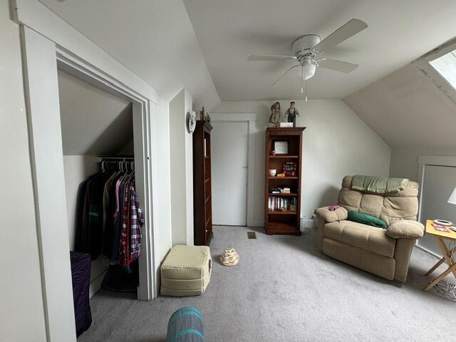 46 Cedar St, Dover-Foxcroft, ME 04426 - sitting room with carpet, lofted ceiling, and ceiling fan