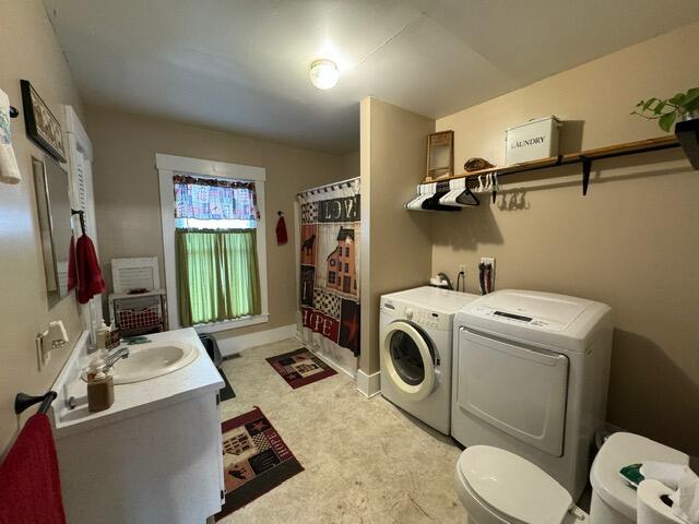 46 Cedar St, Dover-Foxcroft, ME 04426 - laundry room with washing machine and dryer