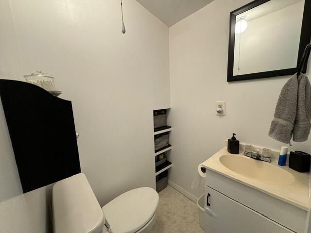 46 Cedar St, Dover-Foxcroft, ME 04426 - half bathroom featuring toilet and vanity