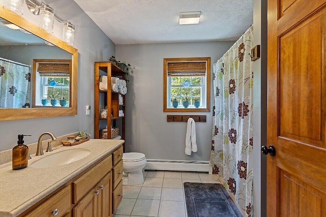 34 Cari Way, Sidney, ME 04330 - bathroom featuring baseboard heating, vanity, tile patterned flooring, a shower with curtain, and a textured ceiling