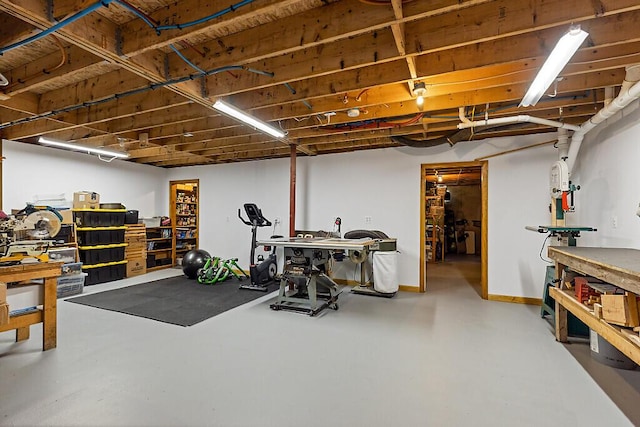 34 Cari Way, Sidney, ME 04330 - exercise area featuring a workshop area and baseboards