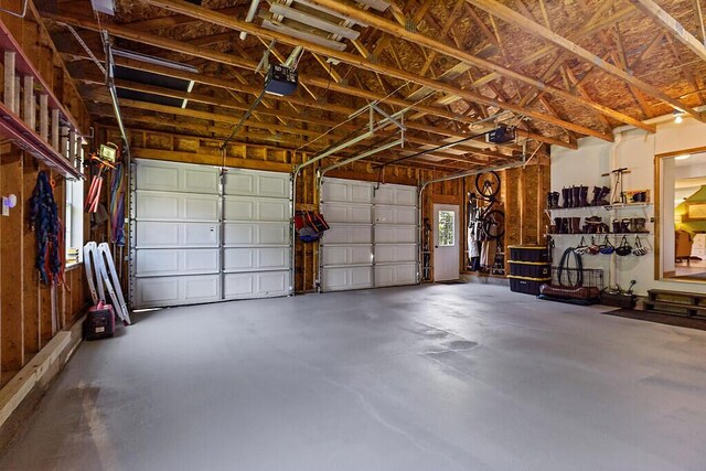 34 Cari Way, Sidney, ME 04330 - garage with a garage door opener