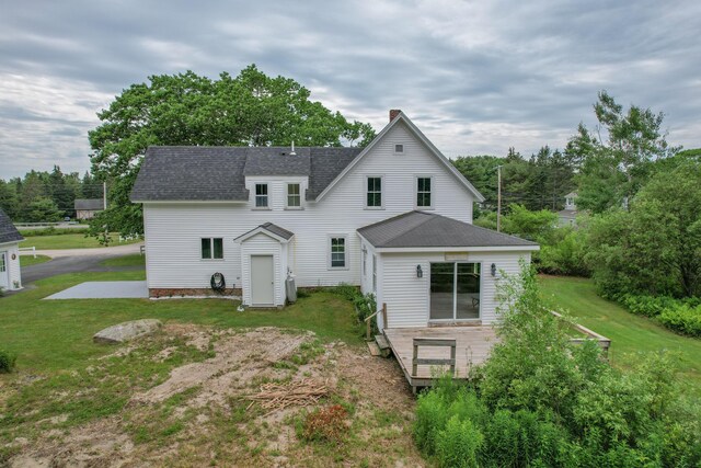 10 Jones Way, Sullivan, ME 04664 - rear view of house with a shingled roof, a yard, and a wooden deck