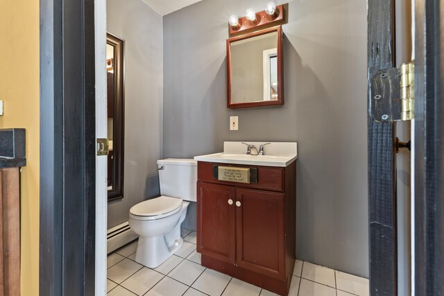 10 Jones Way, Sullivan, ME 04664 - bathroom with a baseboard radiator, tile patterned floors, and vanity