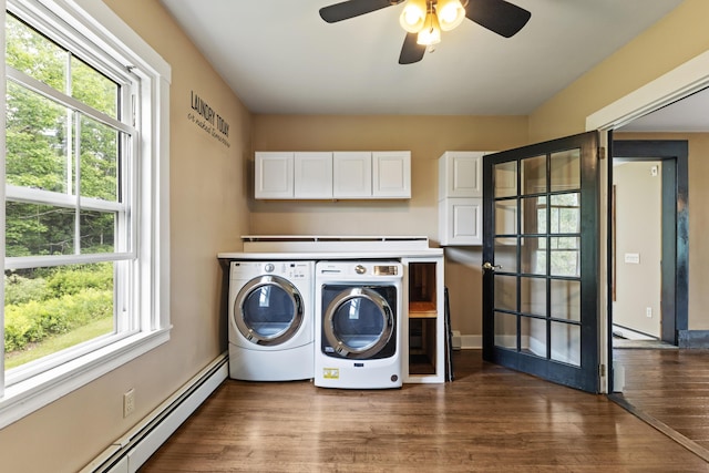 10 Jones Way, Sullivan, ME 04664 - laundry area with independent washer and dryer, cabinet space, a baseboard radiator, wood finished floors, and a ceiling fan