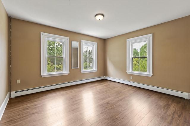 10 Jones Way, Sullivan, ME 04664 - spare room featuring a baseboard heating unit and wood finished floors