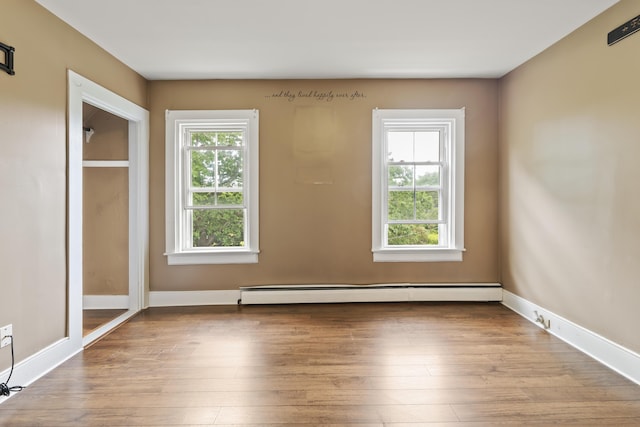 10 Jones Way, Sullivan, ME 04664 - spare room featuring wood finished floors and baseboard heating