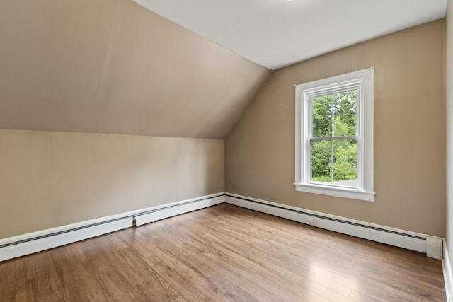 10 Jones Way, Sullivan, ME 04664 - bonus room with vaulted ceiling, wood finished floors, and baseboard heating