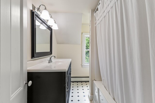 10 Jones Way, Sullivan, ME 04664 - full bathroom featuring tile patterned floors, vanity, and a baseboard radiator