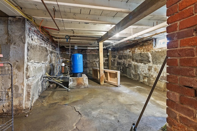 10 Jones Way, Sullivan, ME 04664 - unfinished below grade area with a water pressure tank