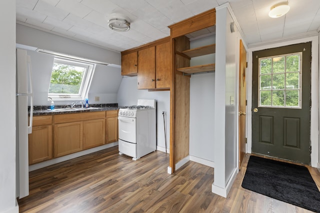 10 Jones Way, Sullivan, ME 04664 - kitchen with white appliances, dark countertops, open shelves, dark wood-style flooring, and brown cabinetry