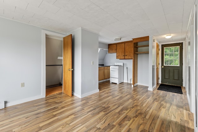 10 Jones Way, Sullivan, ME 04664 - unfurnished living room featuring wood finished floors and ornamental molding