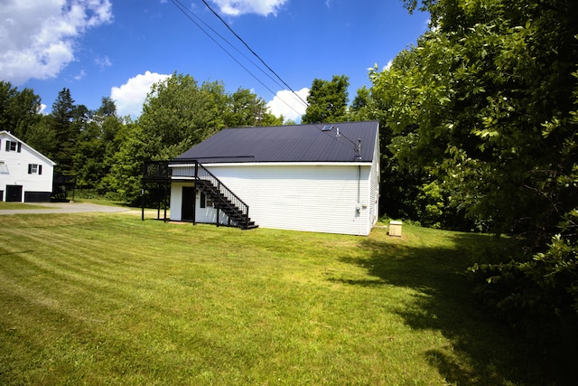 199 Middle Rd, Bradford, ME 04410 - view of green lawn featuring stairs and a wooden deck