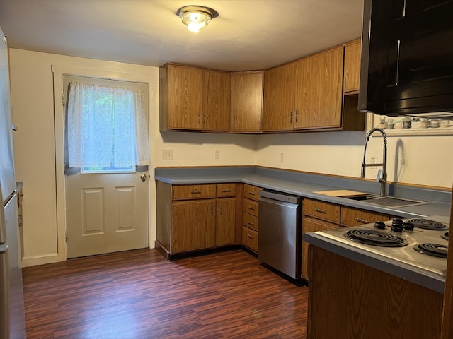 199 Middle Rd, Bradford, ME 04410 - kitchen with appliances with stainless steel finishes, dark wood-style floors, and brown cabinets